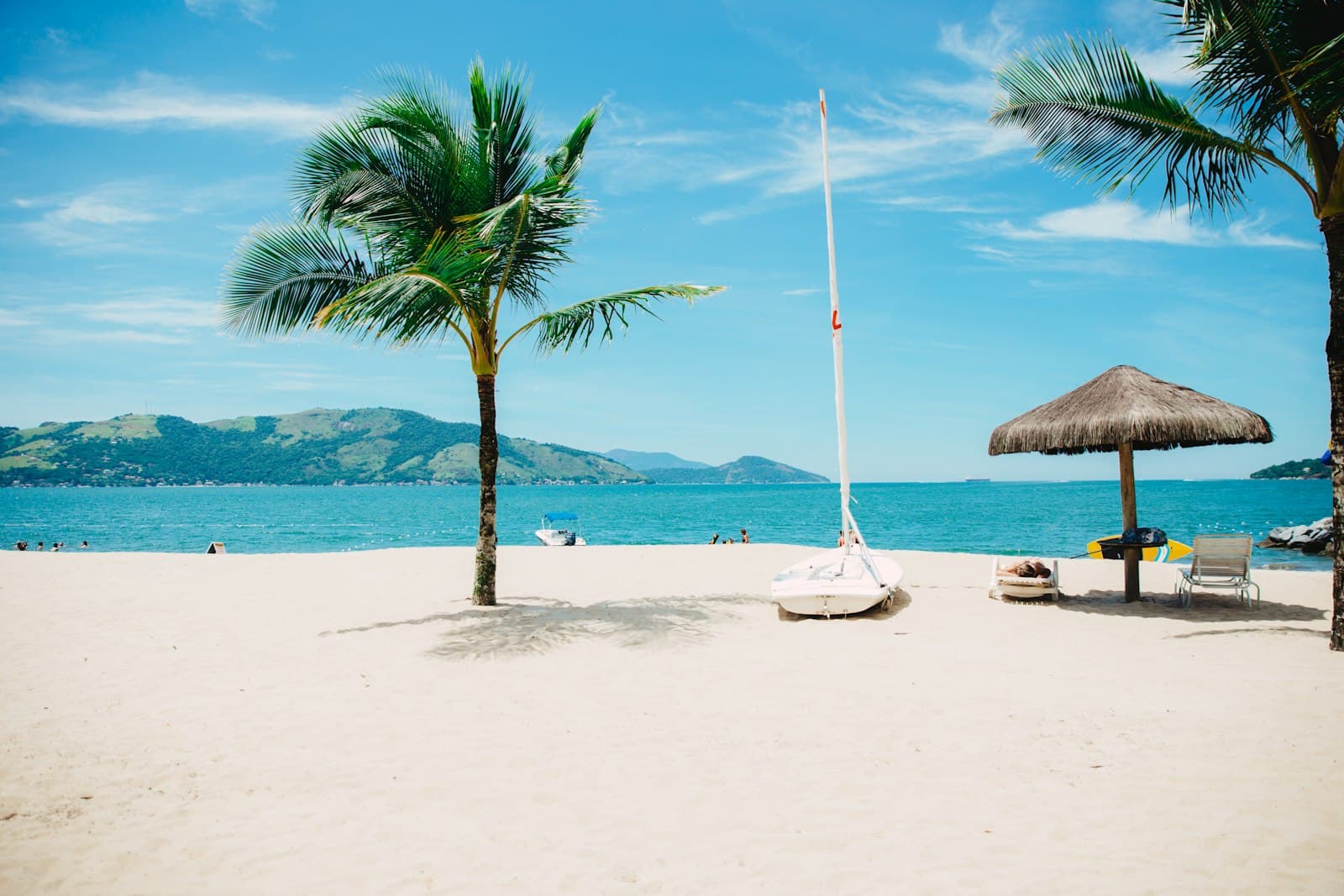 Palm trees and a quiet tropical beach similar to Caye Caulker, Belize